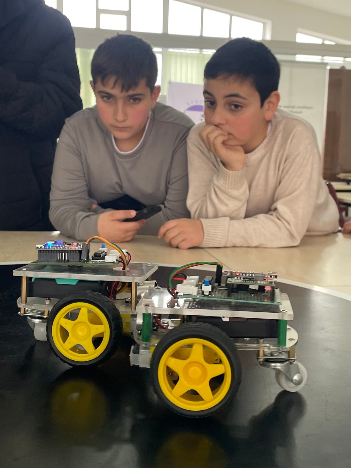 PhysMath students programming their competition robot